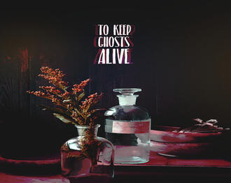 A still life with two glass bottles with flowers and a bowl to their right. On the top middle it says 'To keep ghosts alive'